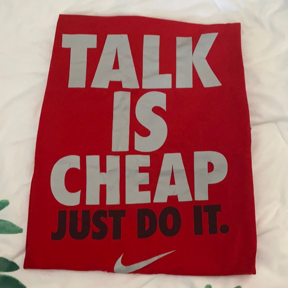 Red Nike extra-large “talk is cheap“ t-shirt. 100% cotton good condition
